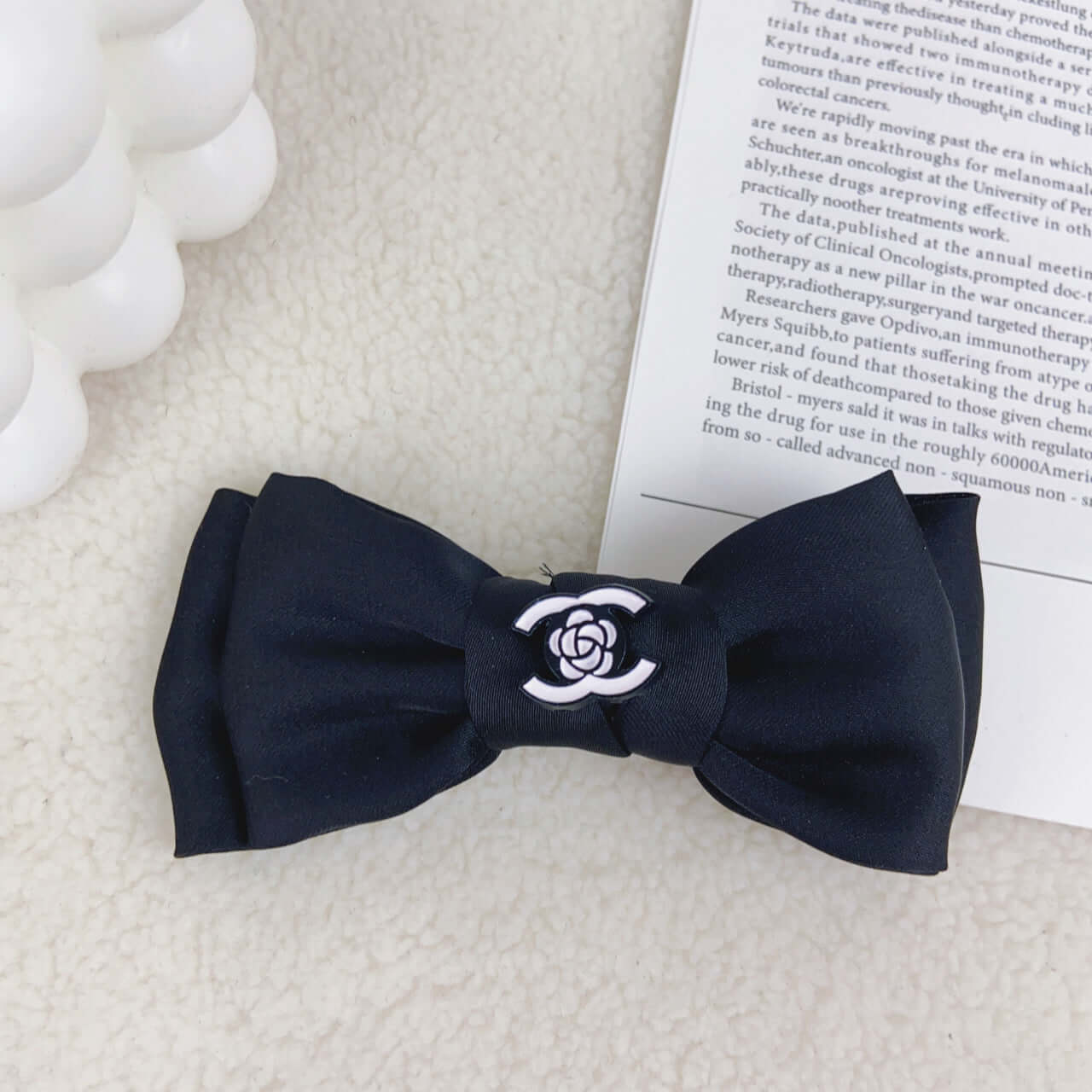 Chewnel dog black hair bow