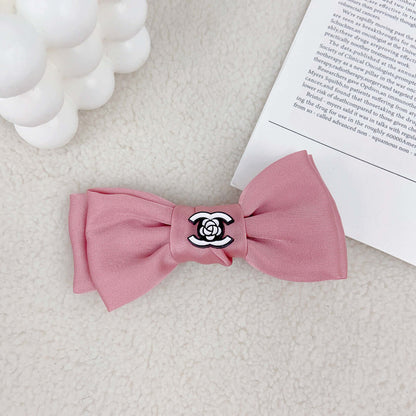 chewnel dog pink hair bow