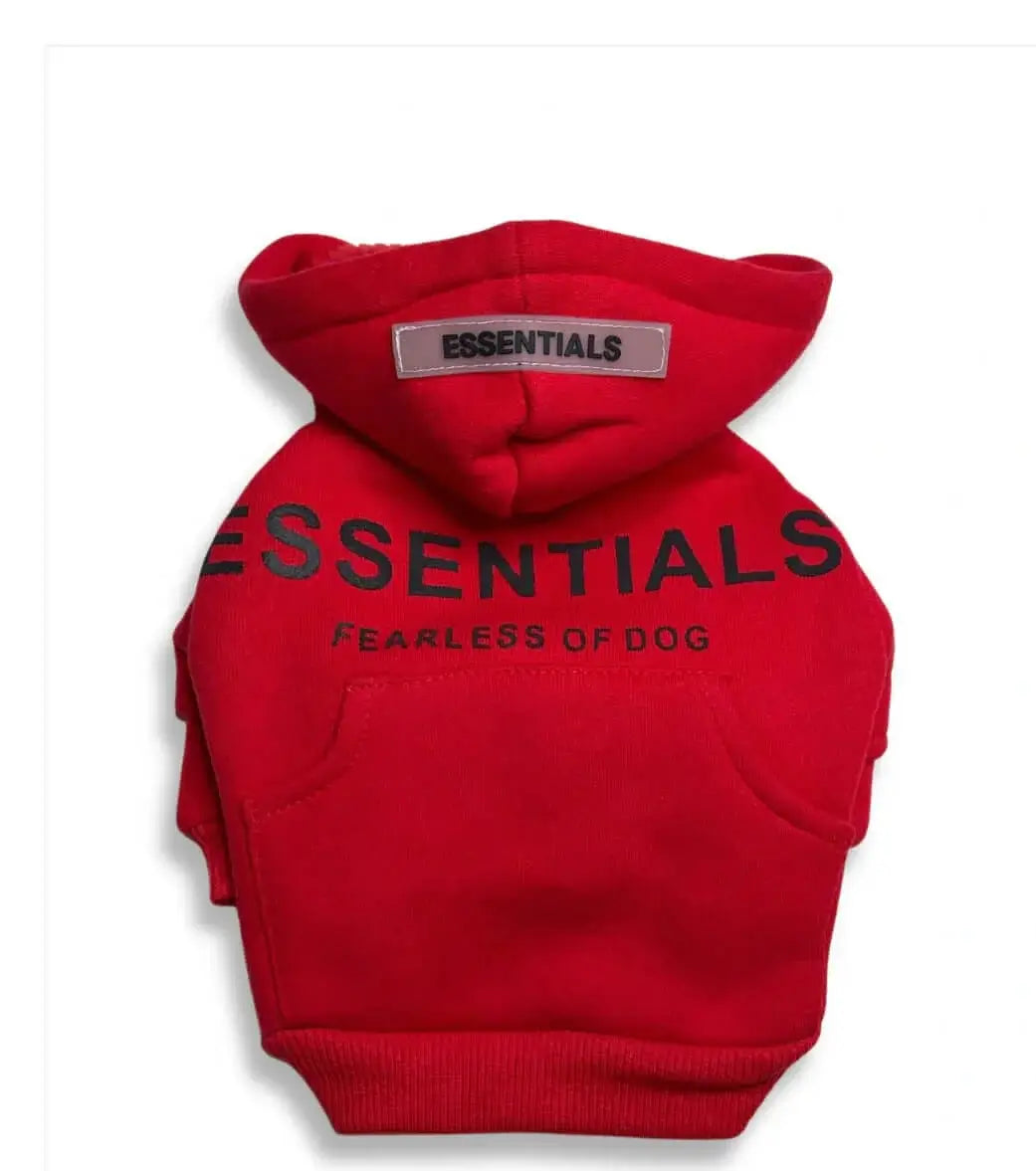 Front view of red Essentials dog hoodie with '7' design and a soft fleece-lined interior for warmth and comfort.